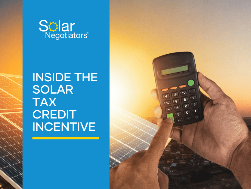 Inside the Solar Tax Credit Incentive Blog image alongside calculator in person's hands in front of solar panels