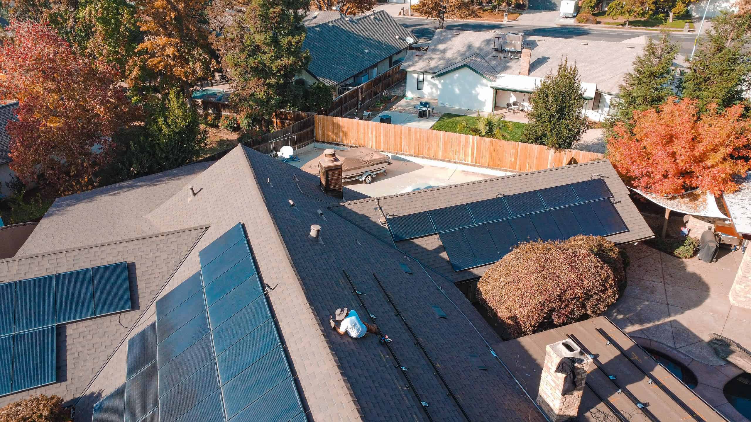 birds eye view of a contractor working on the roof